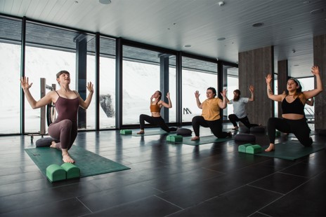 Rise for a morning yoga class in our spa with floor-to-ceiling glass windows